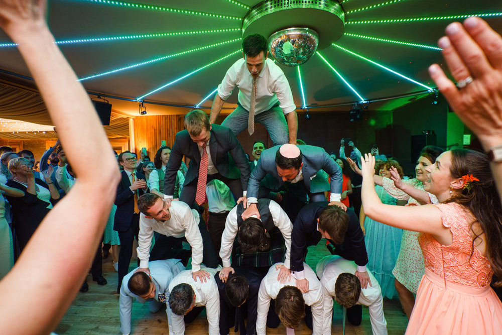 Bright & beautiful Jewish wedding with outdoor ceremony & huge party