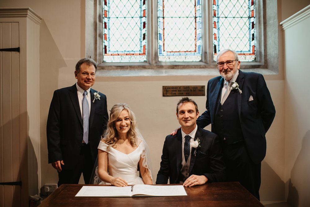 Signing the register at church wedding