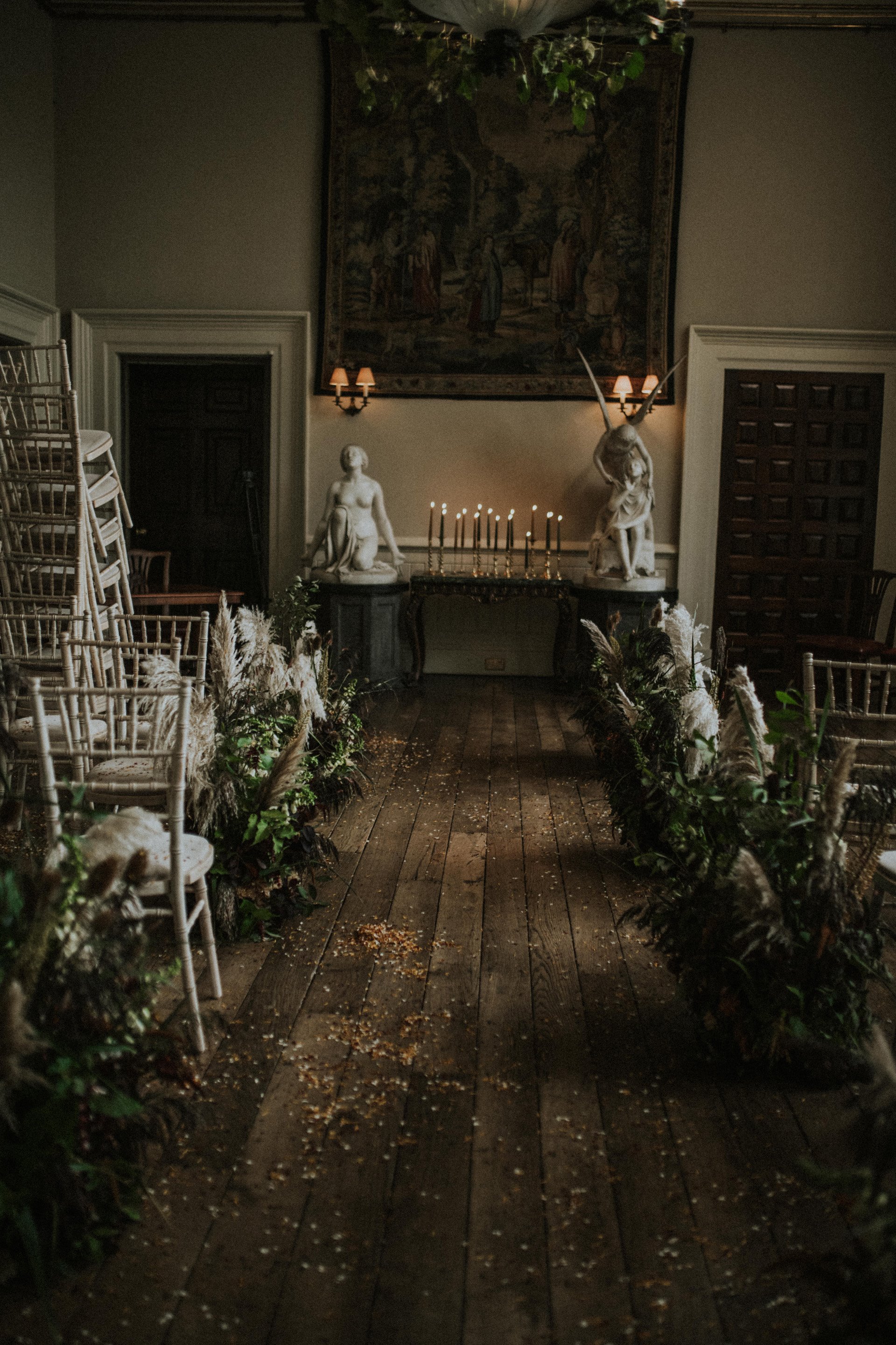 Pampas grass and candlelit wedding aisle for a rustic romantic ceremony at elmore court