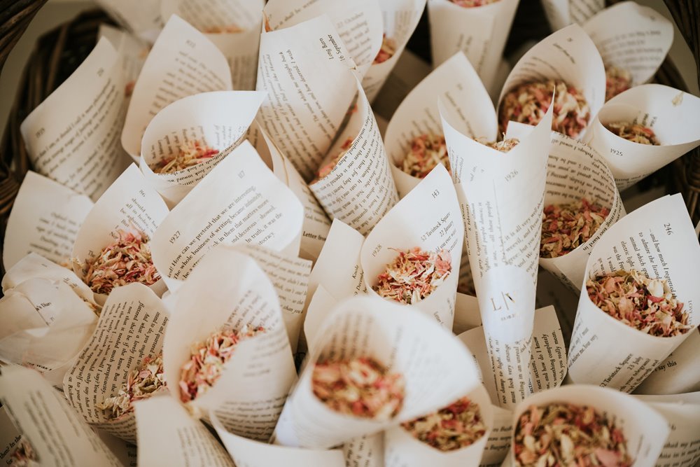 biodegradable confetti, rolled in cones made from the pages of old books