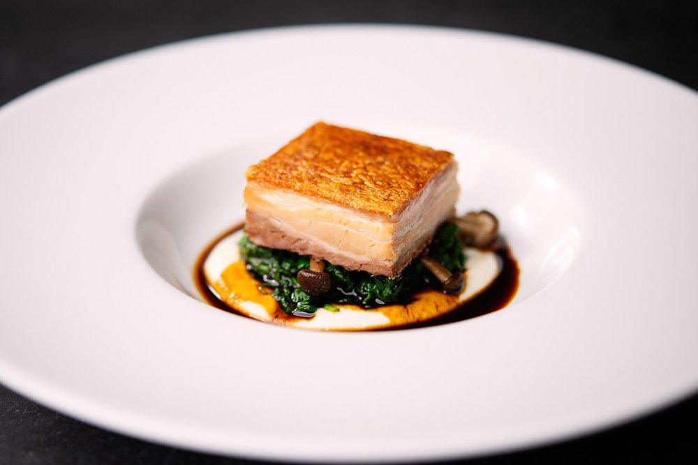 Wedding menus at Elmore Court. Slow roast pork belly, celeriac purée, wild mushrooms, spinach, red wine sauce