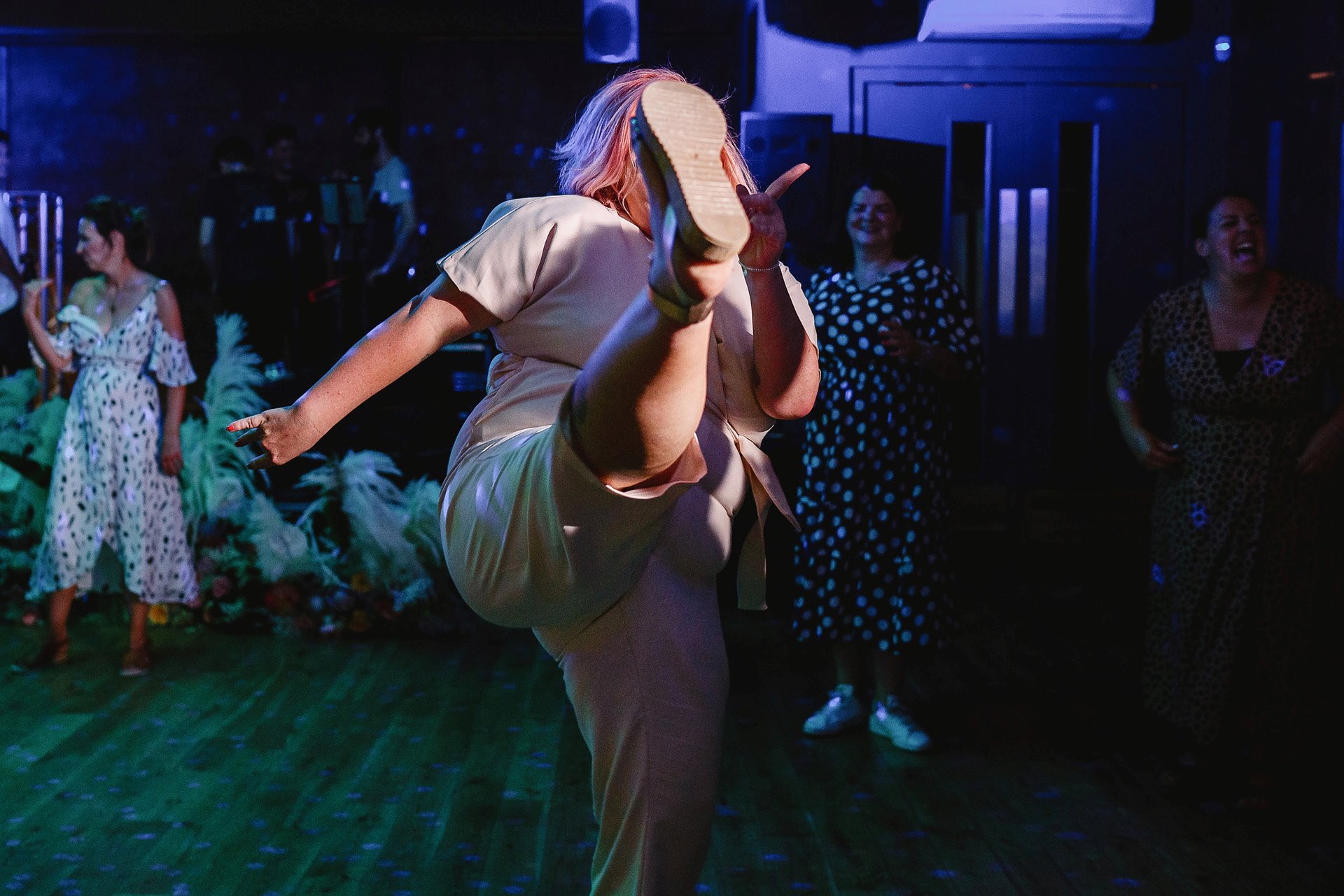 Funny dance moves at party wedding at elmore court in the cotswolds