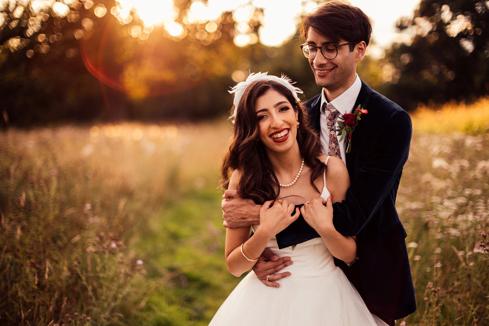 Stunning Pink & Red Wedding with 3 Dresses and a Bridesman