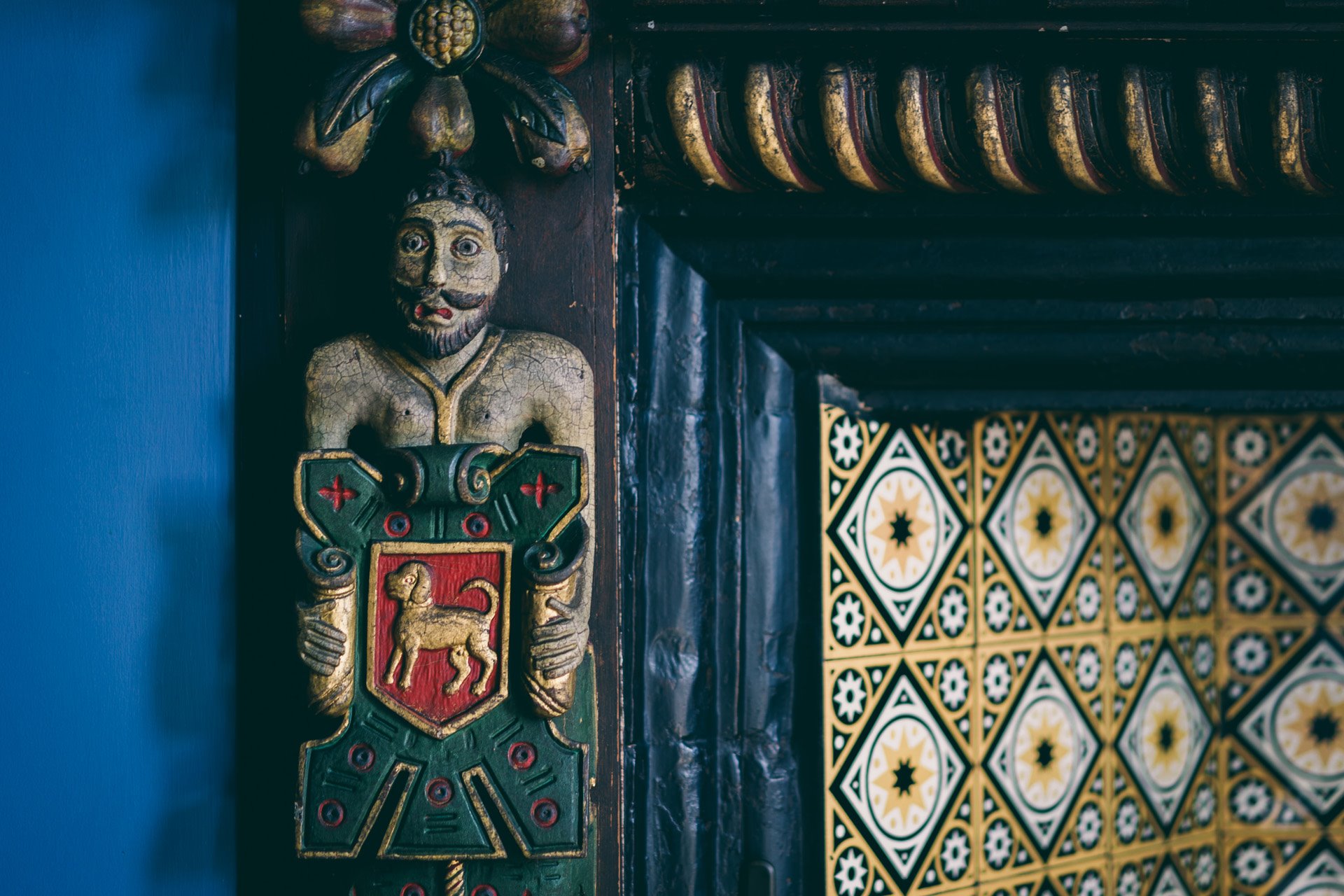 17th century fireplace carving in the oak room at wedding venue elmore court