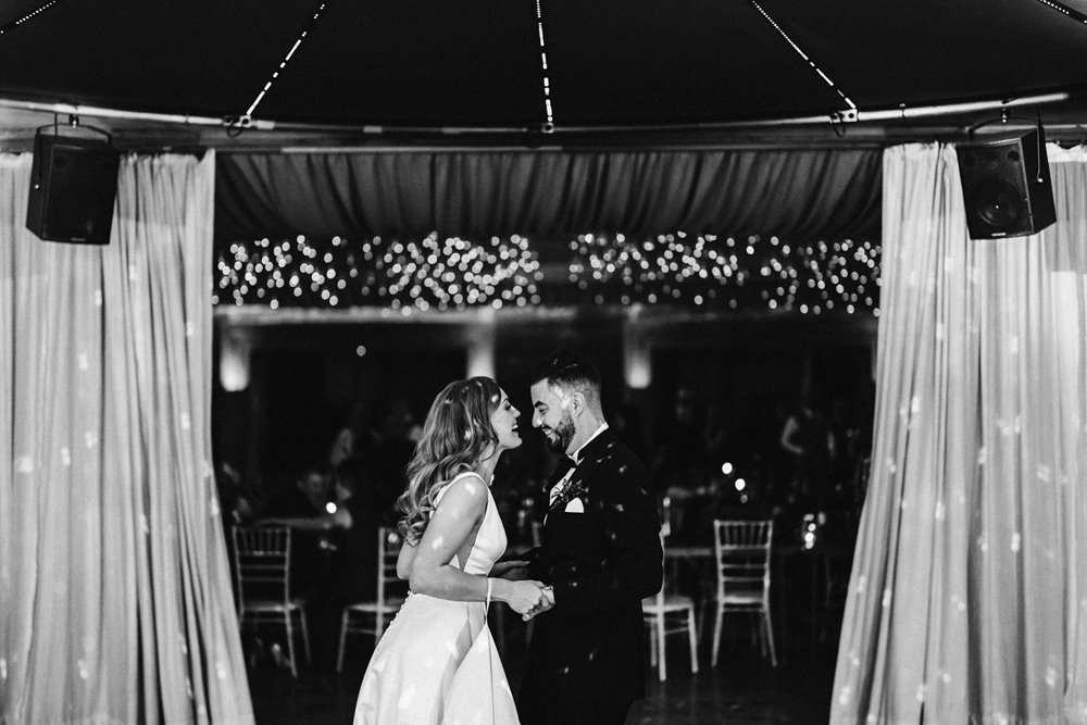 starry night vibes for this rockstar couples first dance at soundproof eco wedding reception venue in the gloucestershire countryside