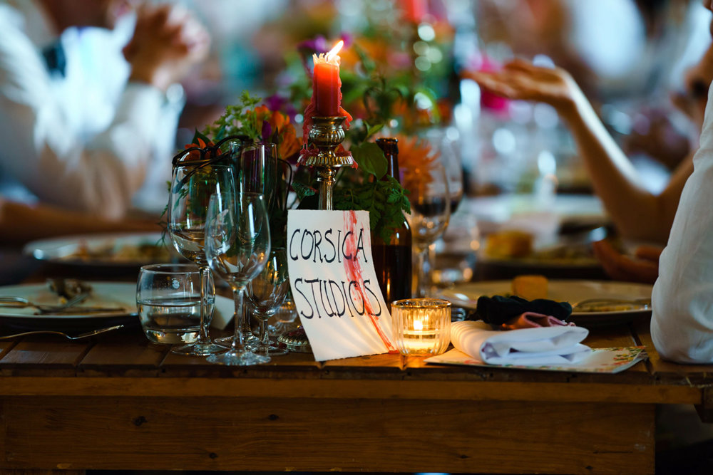 Candlelit wedding reception with bright candles dripping wax