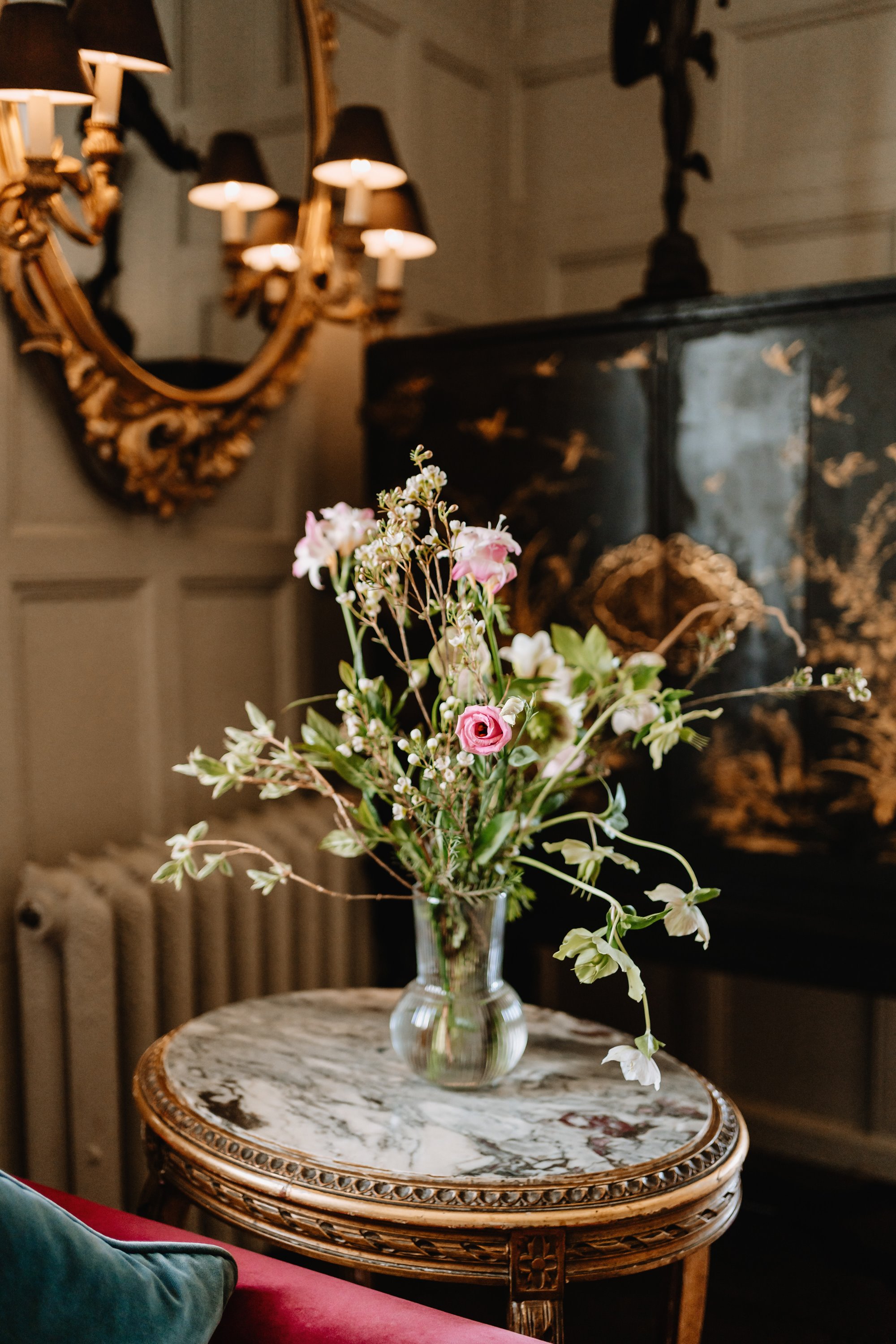 wildflowers in a vase at a wedding reception in a stately gloucestershire home