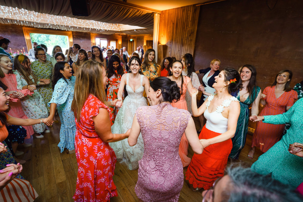 Bright & beautiful Jewish wedding with outdoor ceremony & huge party