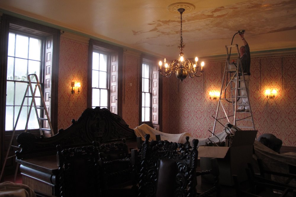 Drawing room in Mansion house elmore court looking shabby amidst building works in the lead up to opening for wedding and events in 2013