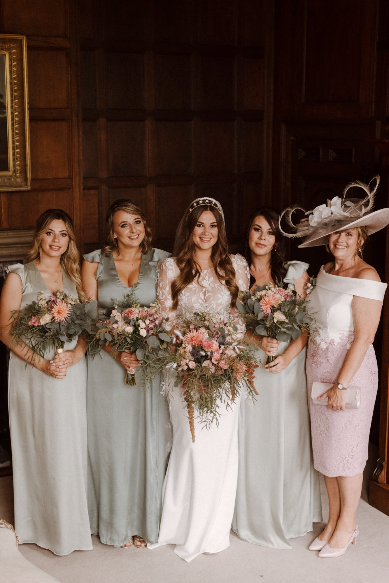 Bridal party in green for boho luxe september wedding