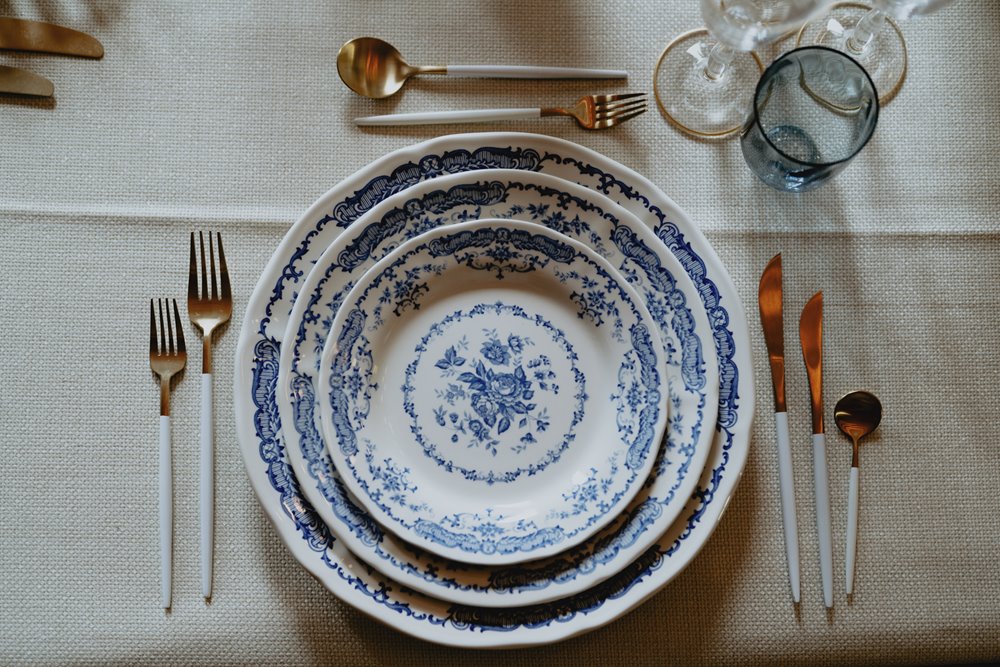 Luxe wedding crockery with vintage blue and white pattern 