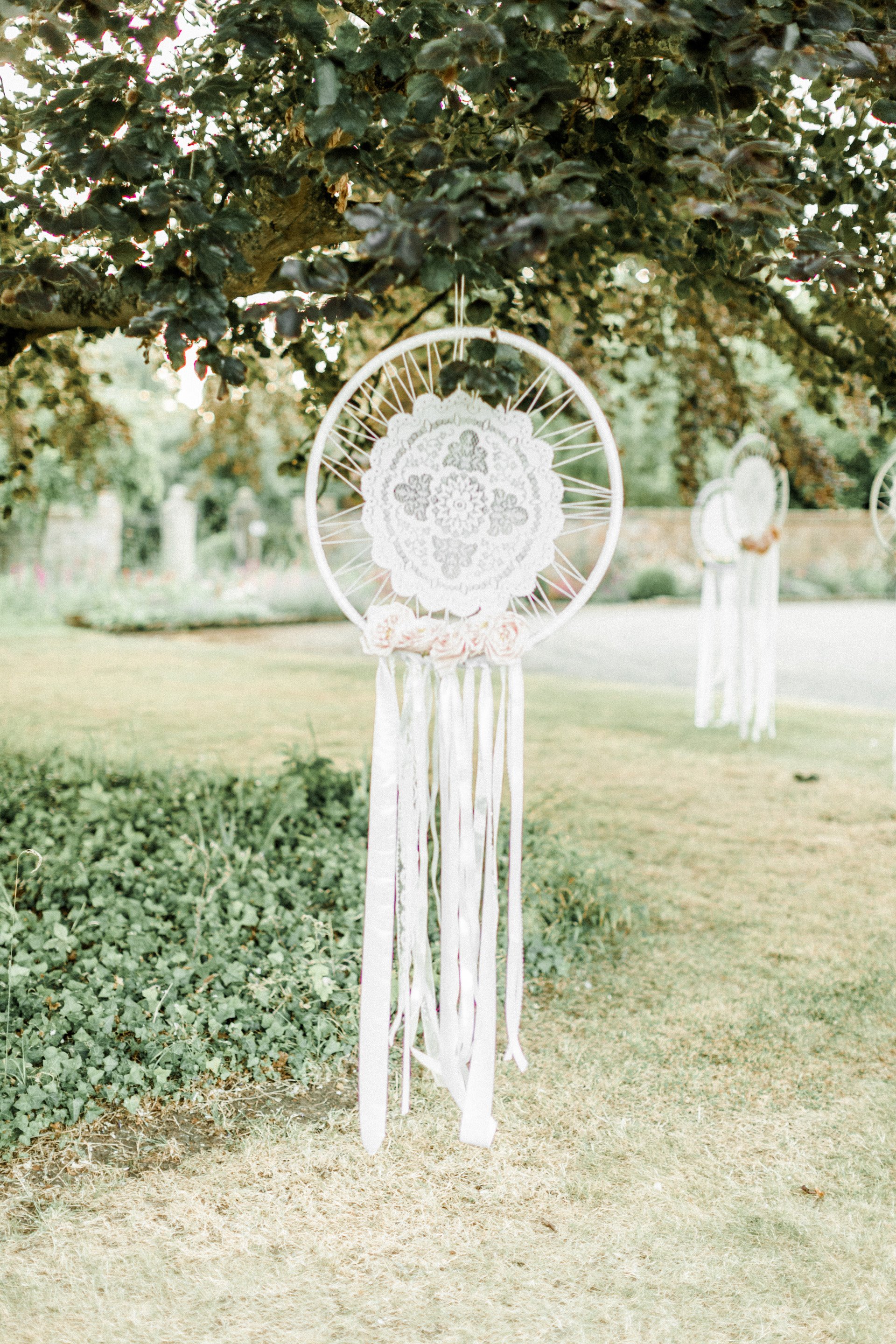 Festival wedding inspiration dreamcatchers hung in trees 2021 and 22