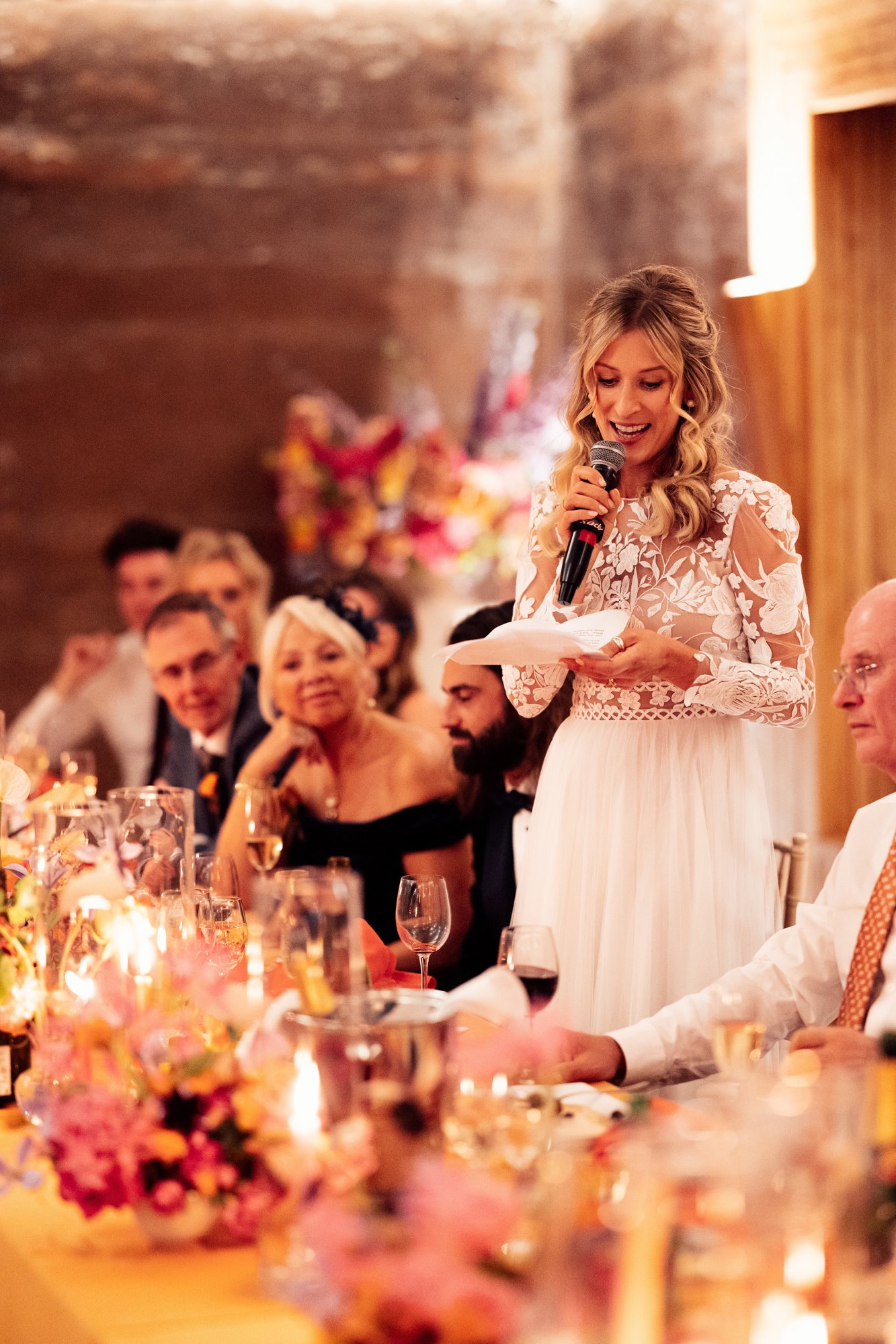 modern bride speech at colourful wedding reception