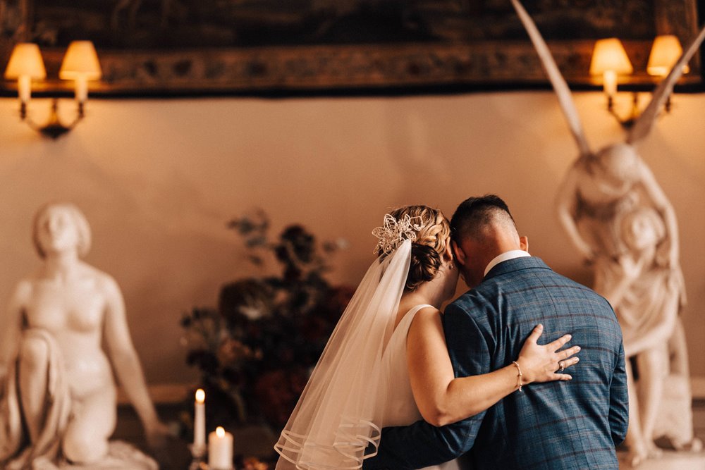 christmas wedding ceremony with bride in veil and headpiece