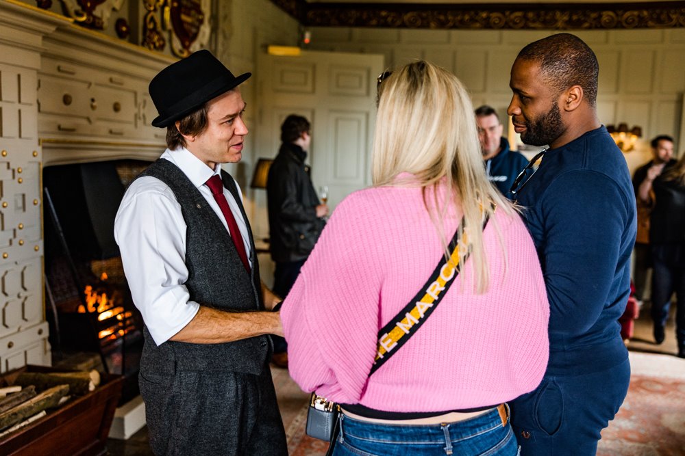 wedding magician amazing guests at wedding fair at elmore court in the cotswolds