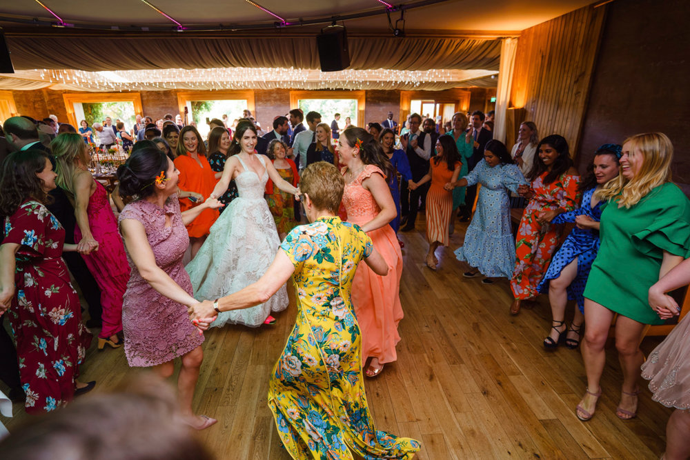 Bright & beautiful Jewish wedding with outdoor ceremony & huge party