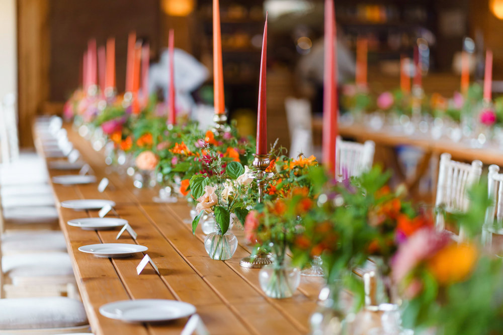 Brigh wedding flowers and candles for jewish summer wedding reception