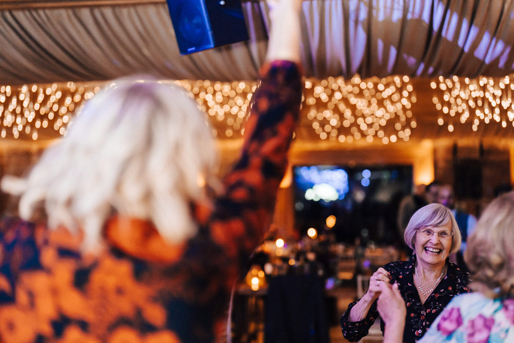 wedding guests having the best time ever at party wedding with magical theme for october 