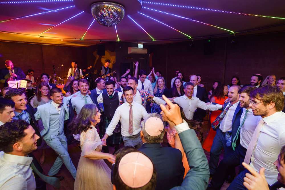 Bright & beautiful Jewish wedding with outdoor ceremony & huge party