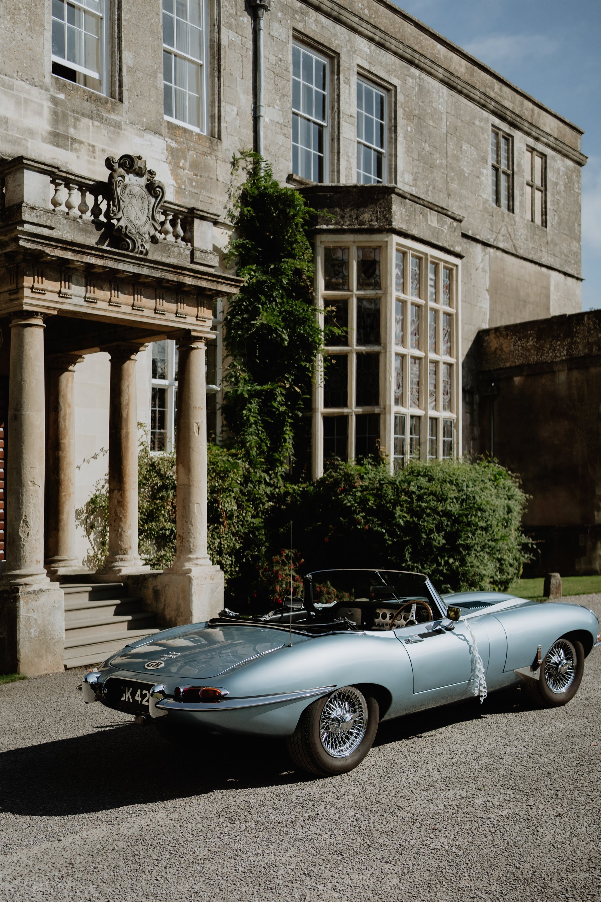 Classic car outside Elmore Court waiting to pick up a newly married bride and groom