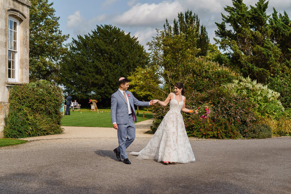 Bright & beautiful Jewish wedding with outdoor ceremony & huge party