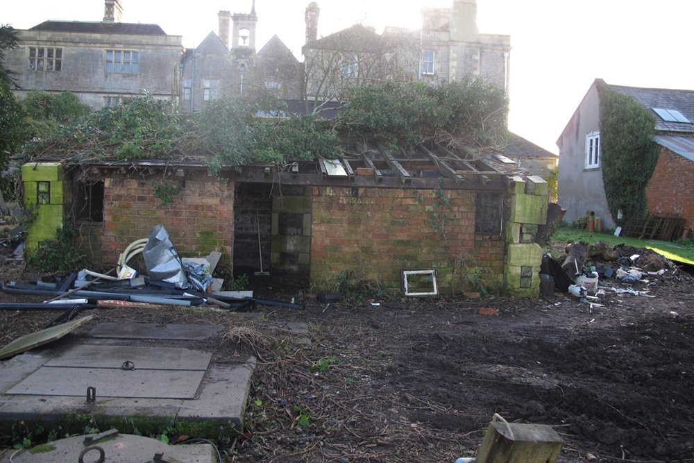 Shed and wood store at Mansion house elmore court before it was turned into a staff office amidst building works in the lead up to opening for wedding and events in 2013