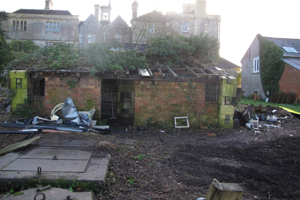 Shed and wood store at Mansion house elmore court before it was turned into a staff office amidst building works in the lead up to opening for wedding and events in 2013