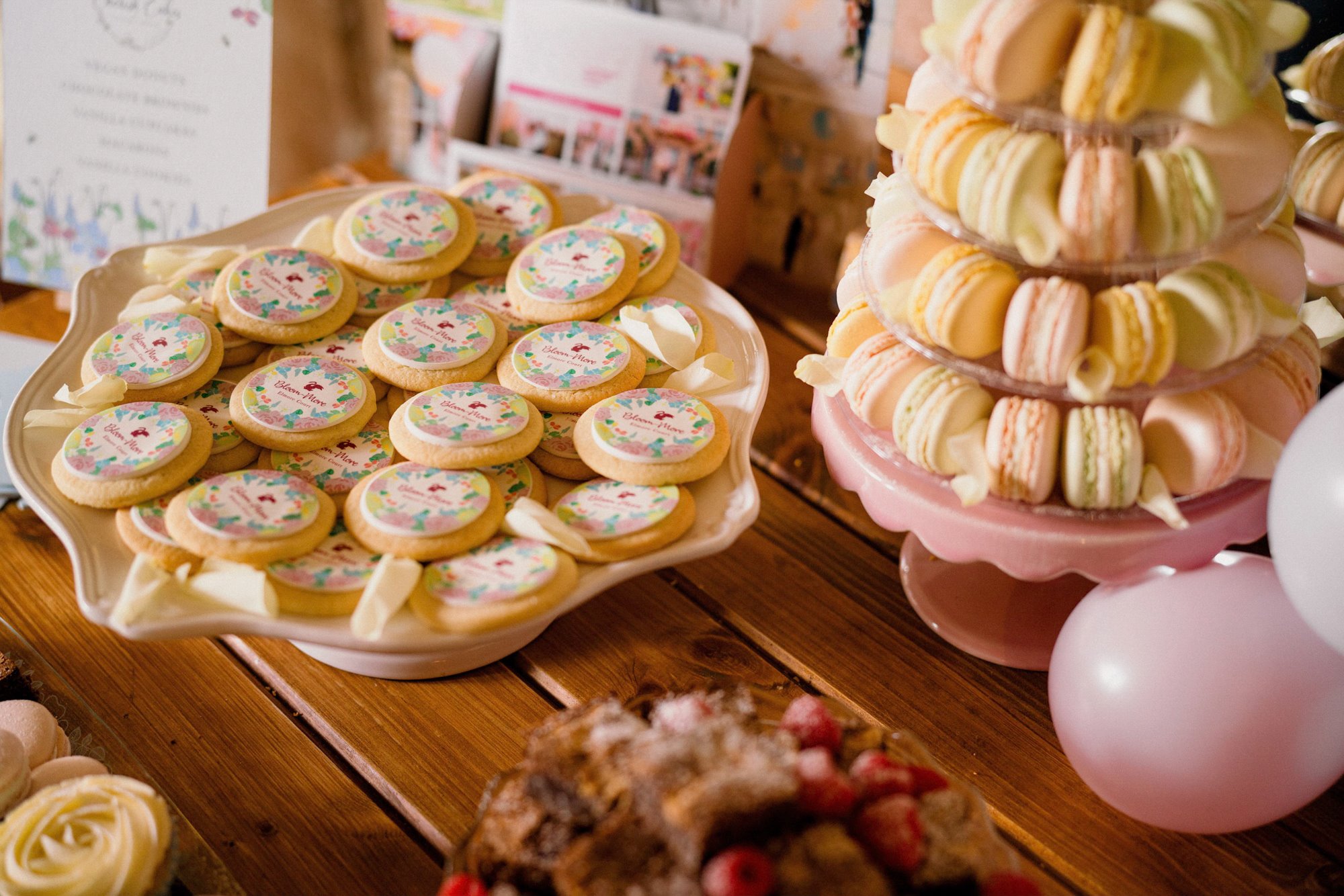 Macaroons and biscuits with messages for a tea party theme wedding