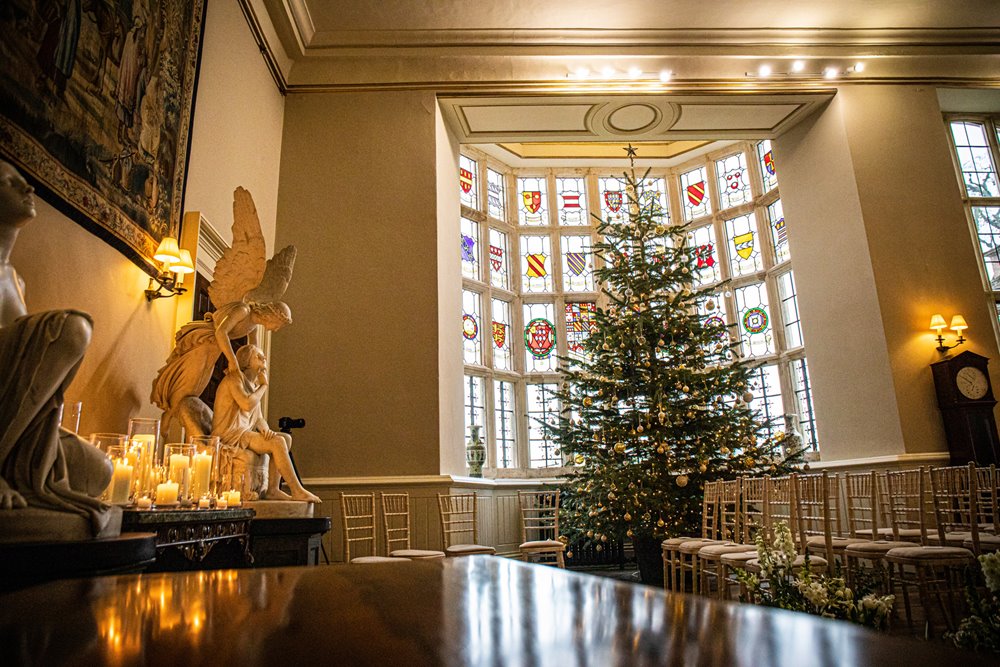 Christmas wedding with tree, angels and candles at stately home elmore court