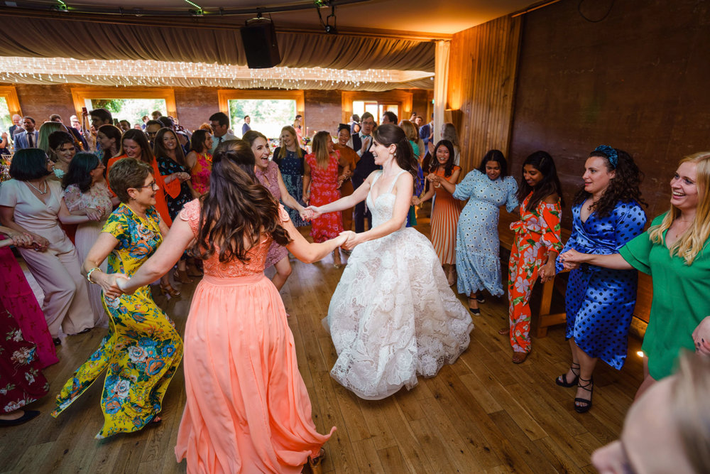 Bright & beautiful Jewish wedding with outdoor ceremony & huge party