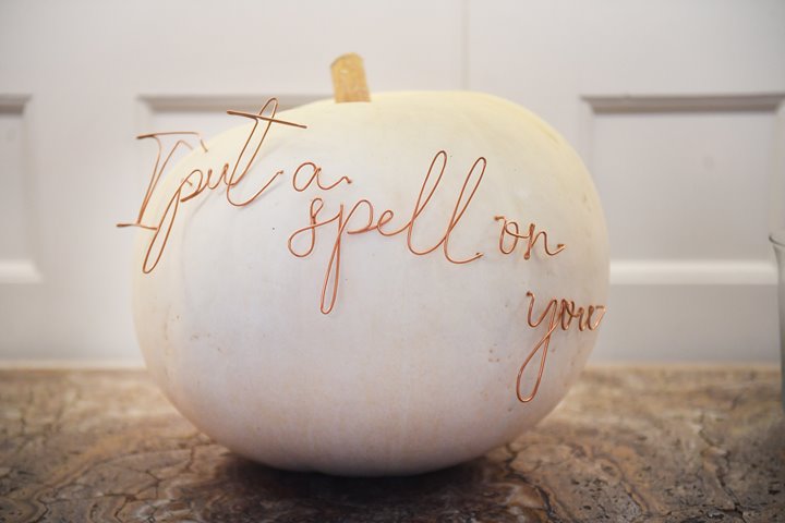 White wedding pumpkin with I put a spell on you sign for a Hocus Pocus inspired Halloween wedding at a mansion house in UK