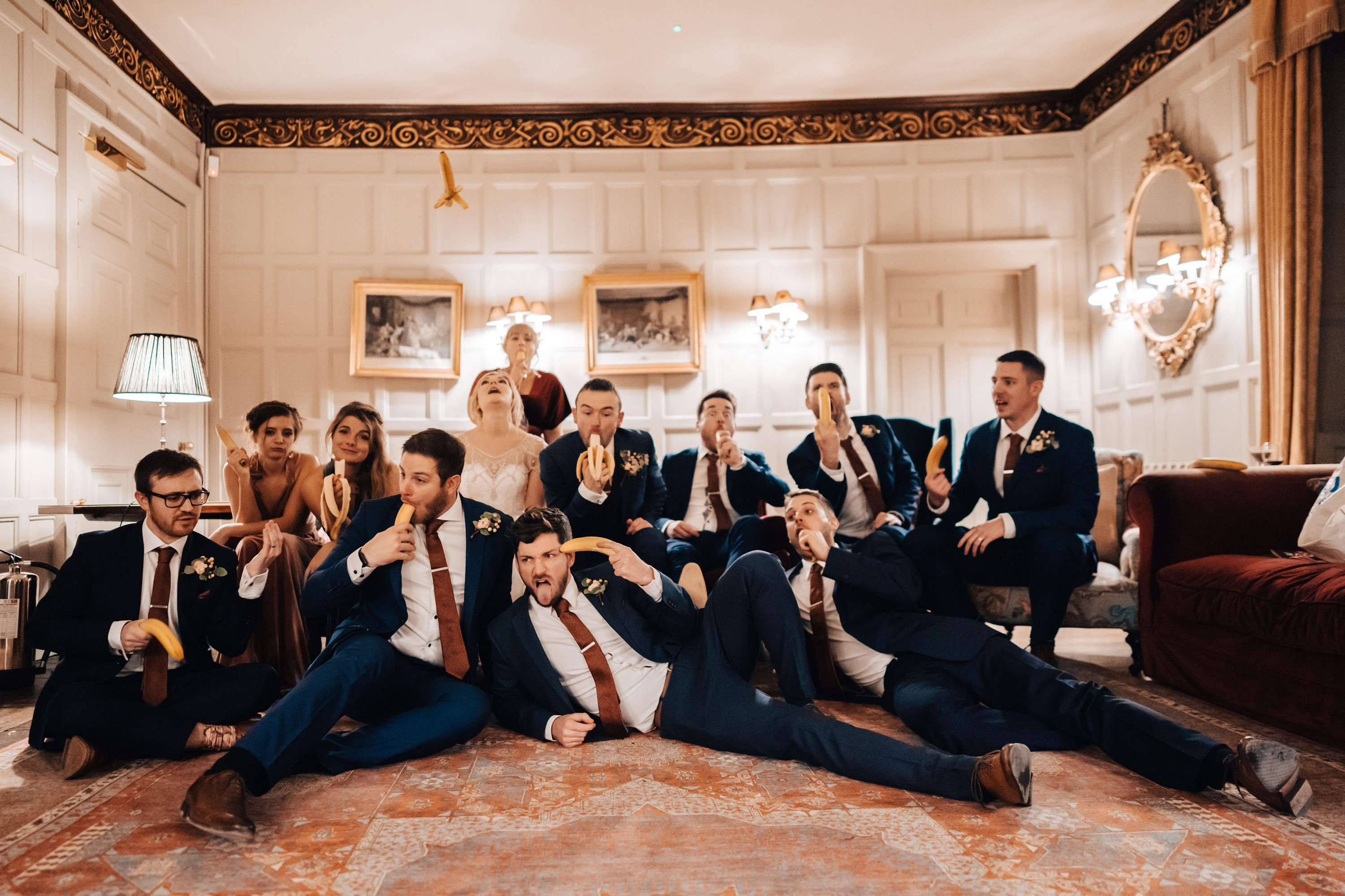 Fun indoor group shot wedding photography, when you can't go outside, get creative