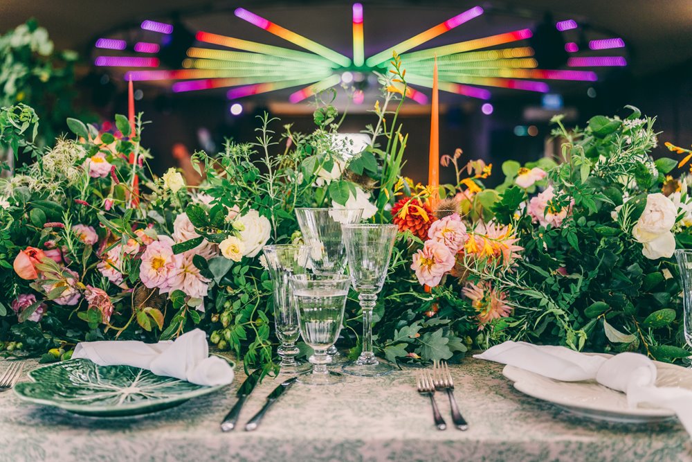 Soundproof Party wedding venue with cool lighting decorated with beautiful bright florals for Harvestival wedding fair