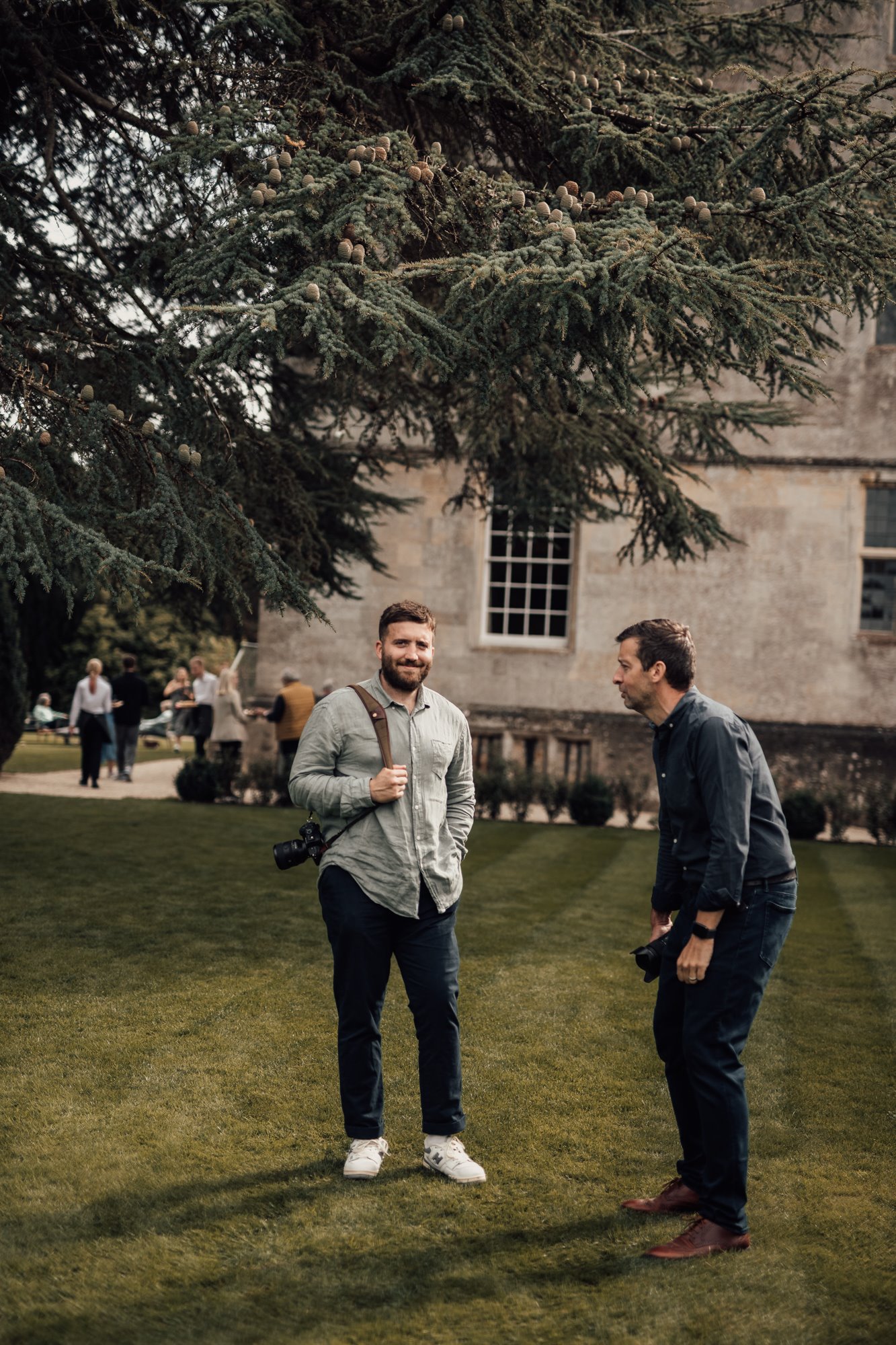 Wedding photographers in Gloucester caught on camera having a chin wag