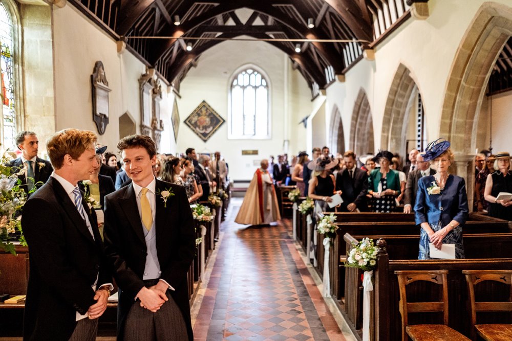Vicar walks down aisle at wedding church elmore