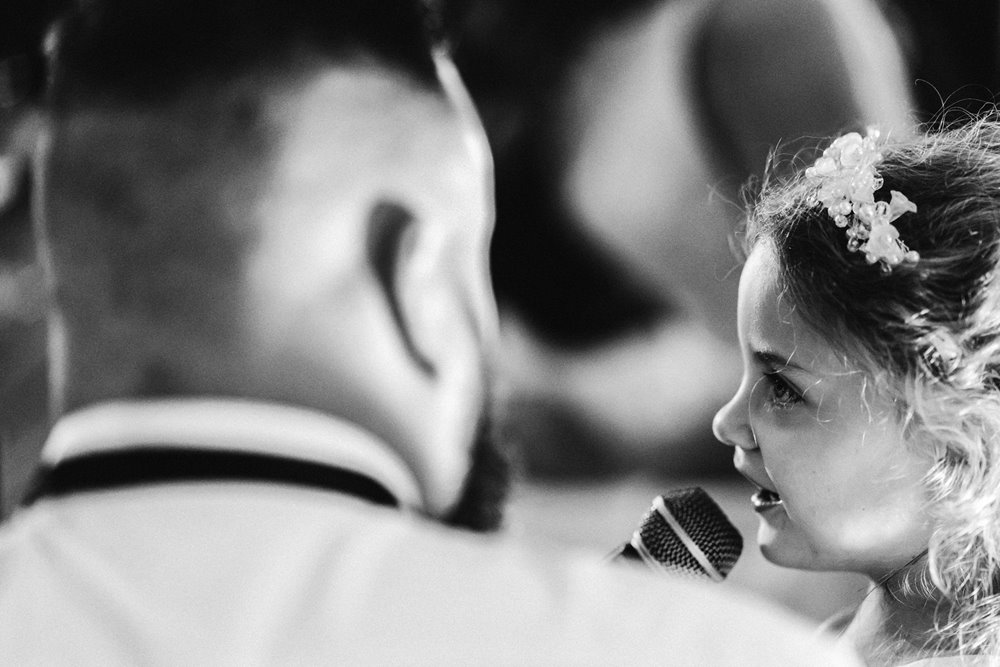 groom's daughter making a speech at child friendly wedding in an eco venue in the cotswolds