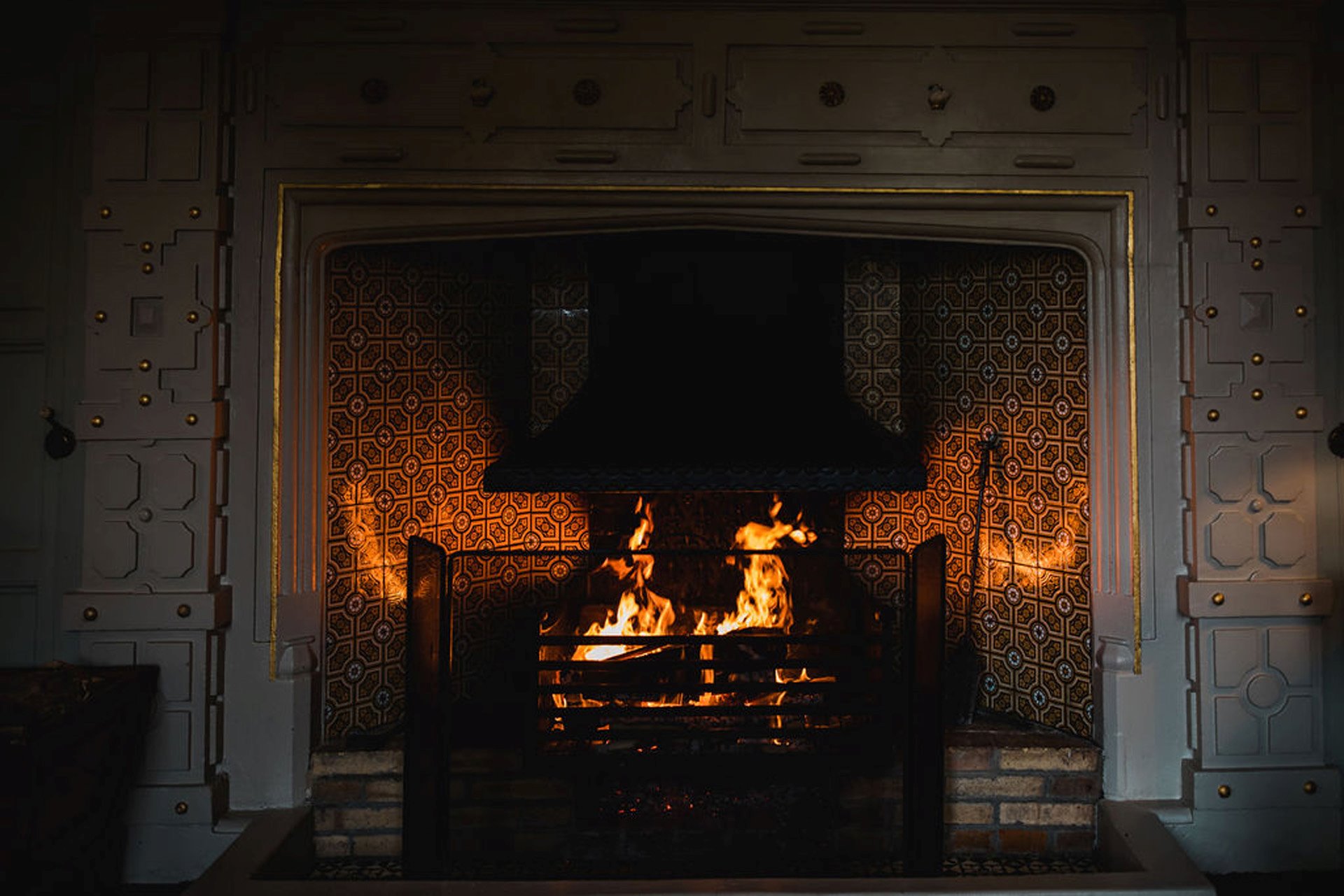 Open fire lit for a hygge micro wedding in the autumn