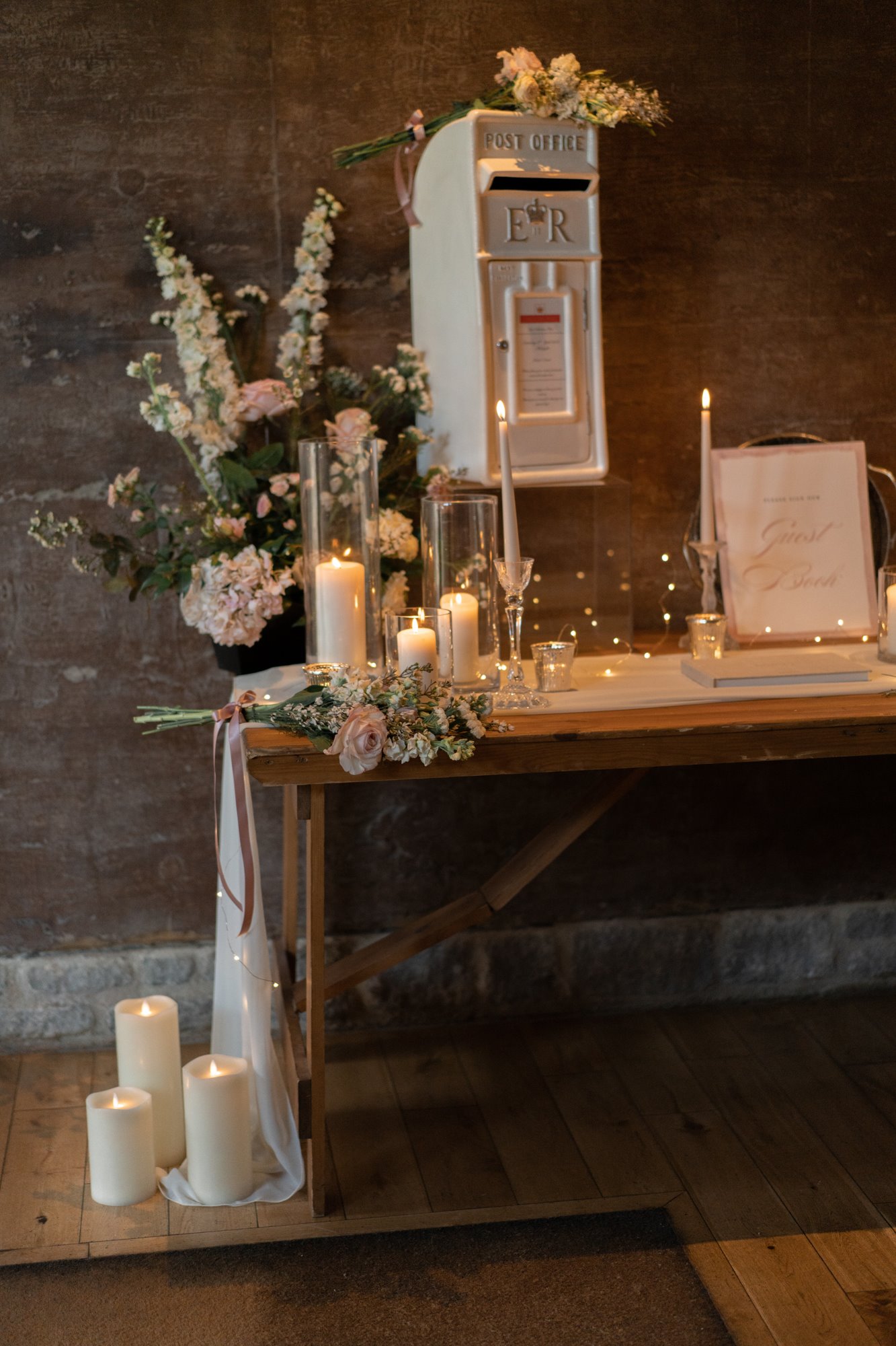 English fairytale wedding with white postbox and luxe florals