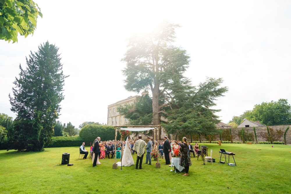 Bright & beautiful Jewish wedding with outdoor ceremony & huge party